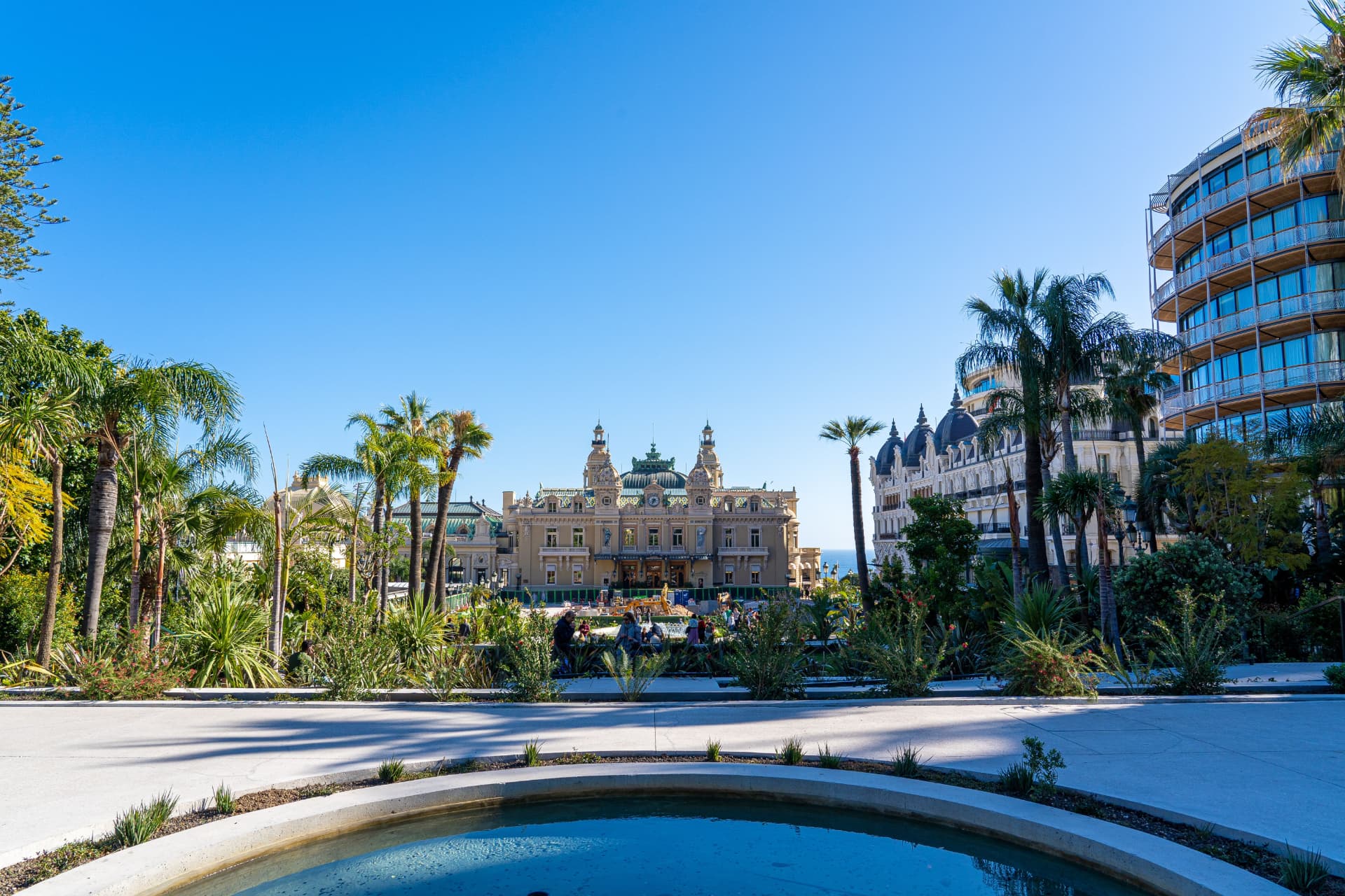 Monte Carlo Casino and gardens under a clear blue sky